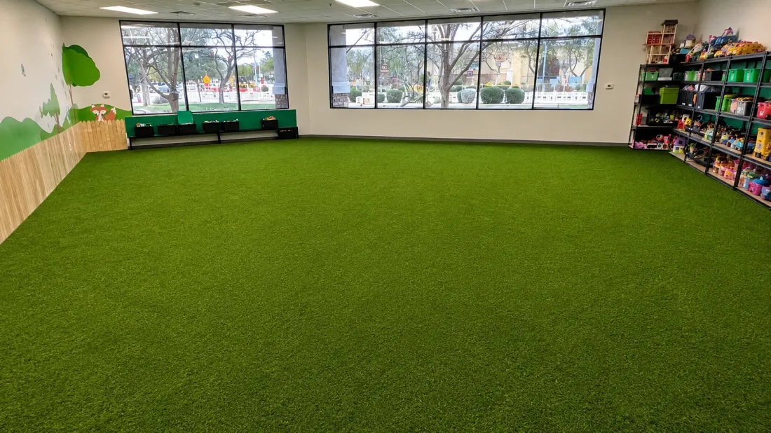 Playground turf surface in a childrens play area