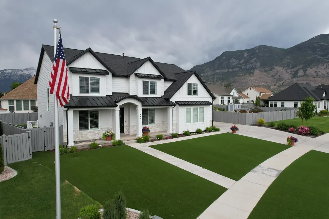 Residential artificial turf lawn in a front yard