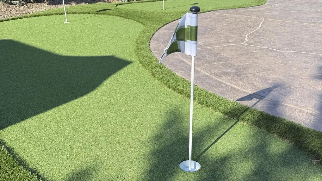 Backyard putting green turf installation