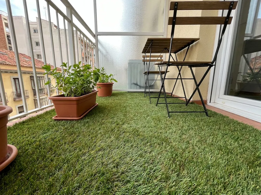 Artificial turf on a small apartment balcony