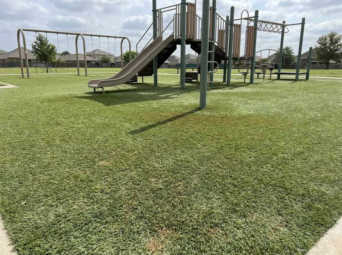 Playground turf surface in a childrens play area