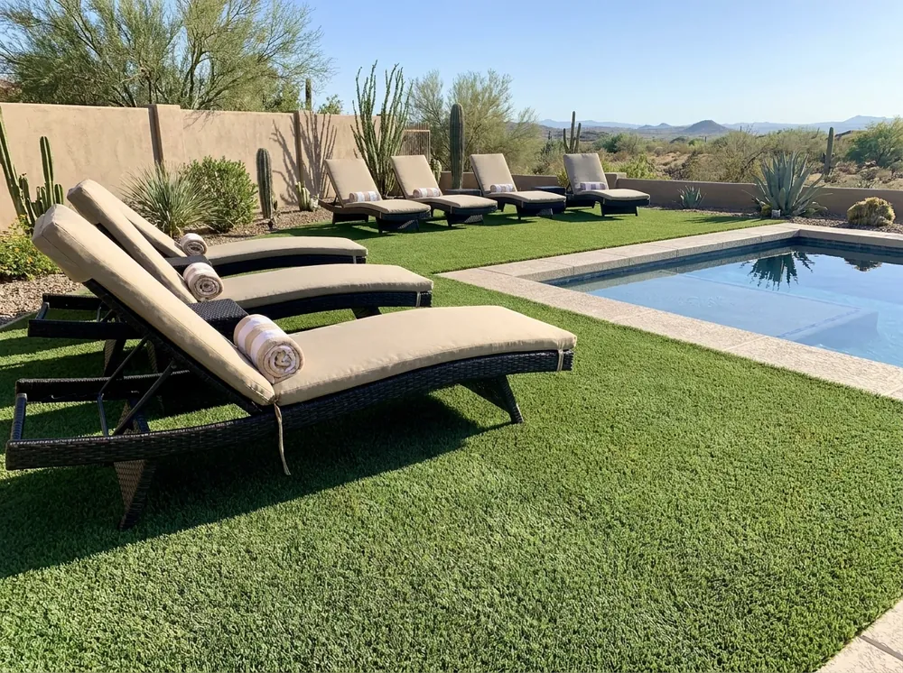 Finished premium artificial turf installation in an Arizona backyard by The Turf Yard